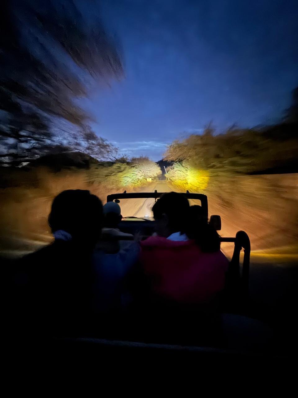 Jeep racing out at dusk